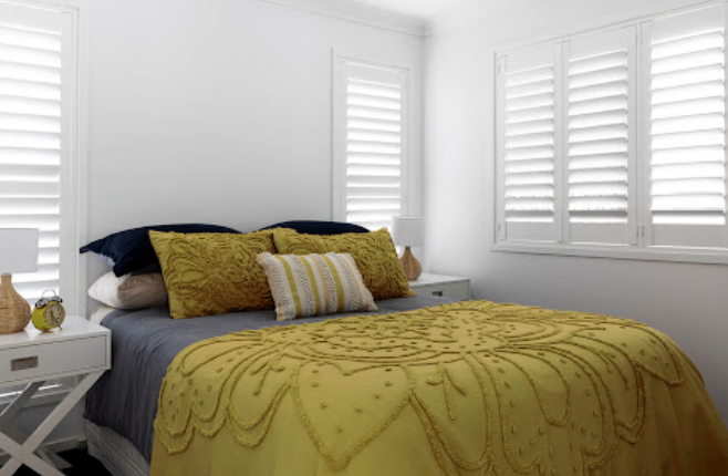 Plantation window shutter installed by Shutters and Shades