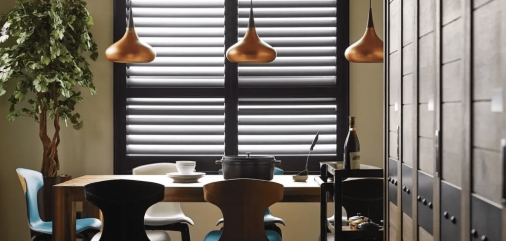 Installer aligning window blinds evenly for precise light control and smooth operation.