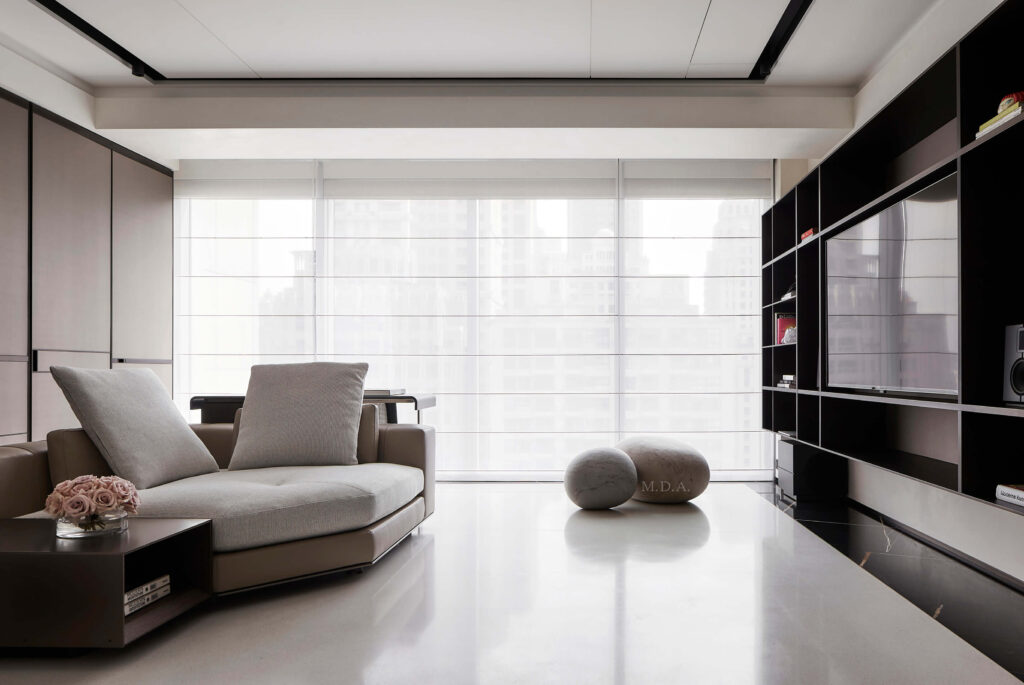 Roman shades in Wesley Chapel living room from Shutters and Shades