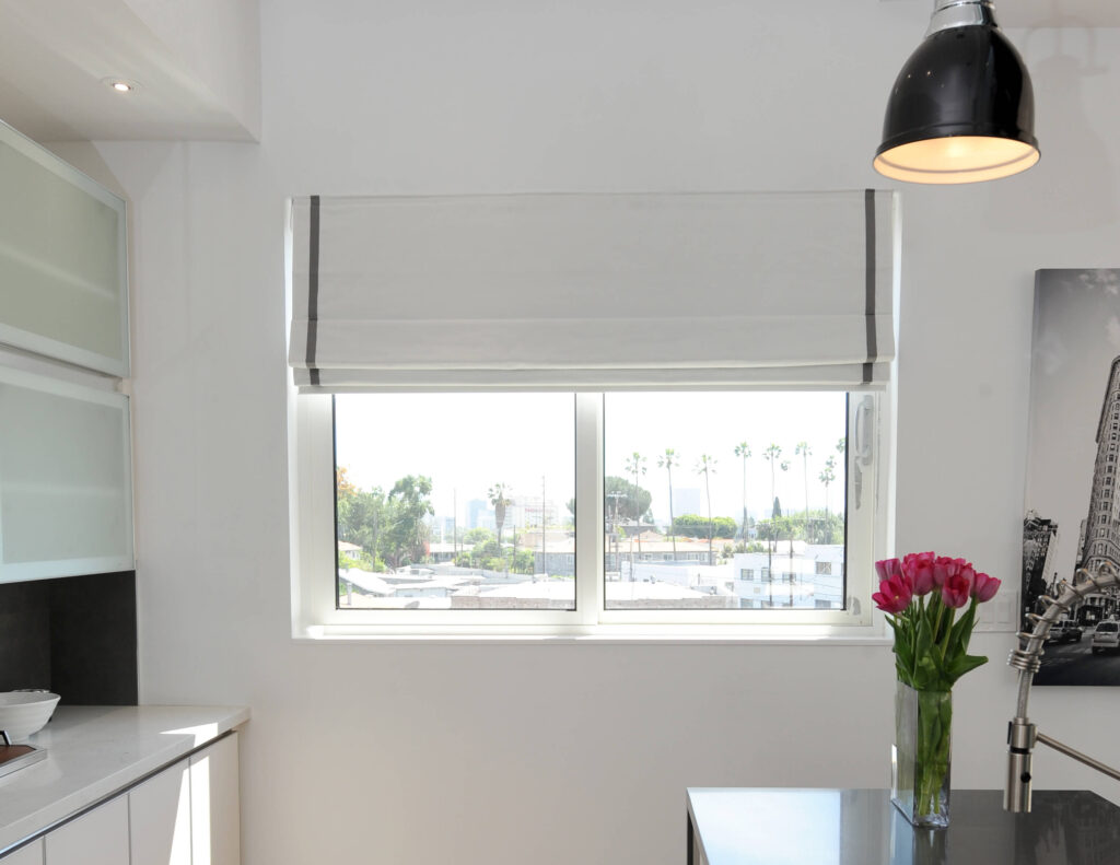 Roman shades in Wesley Chapel living room from Shutters and Shades near me