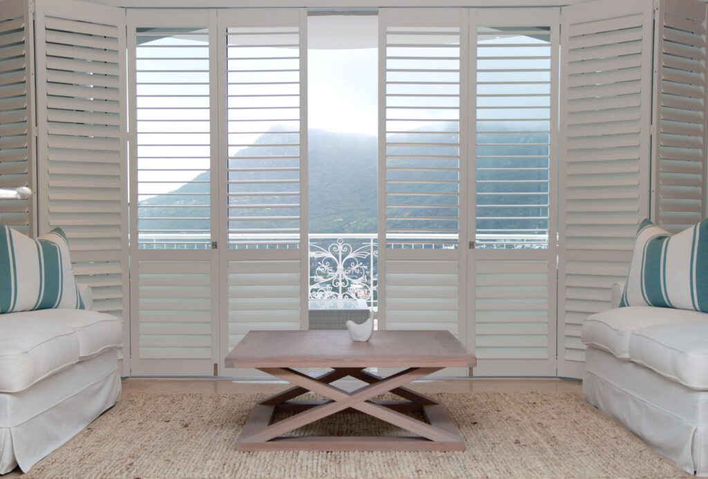 Custom window shutters installation in Hyde Park, FL by Shutters and Shades.