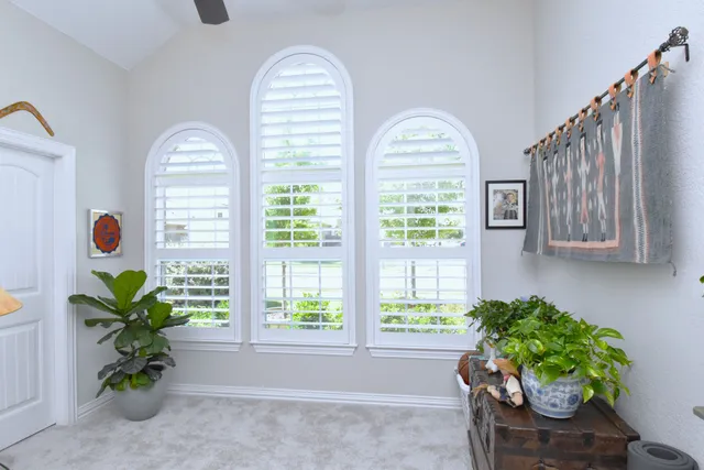 Stylish plantation shutters enhancing natural light in a Hudson, FL home