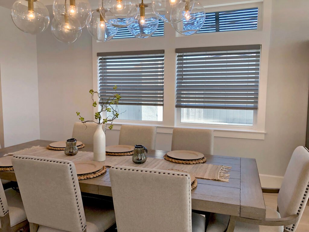 Technician adjusting Window Blinds in a Tierra Verde - FL near me waterfront bedroom for glare control