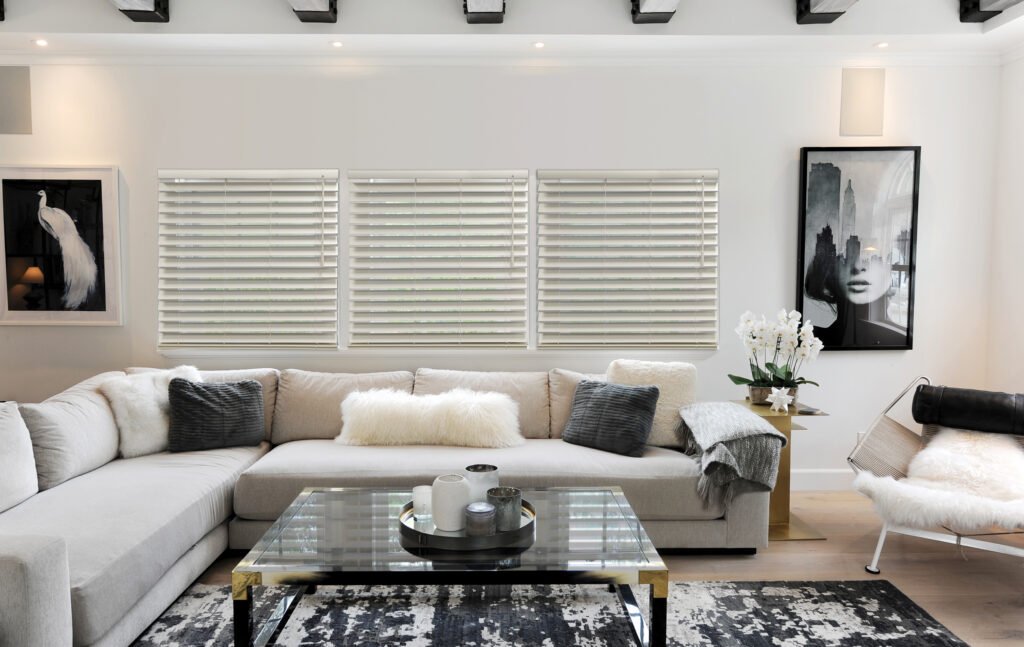 Technician adjusting Window Blinds in a Tierra Verde - FL waterfront bedroom for glare control